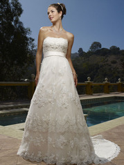 The beaded (Chantilly) lace overlay scallops on the neckline with elaborate hand